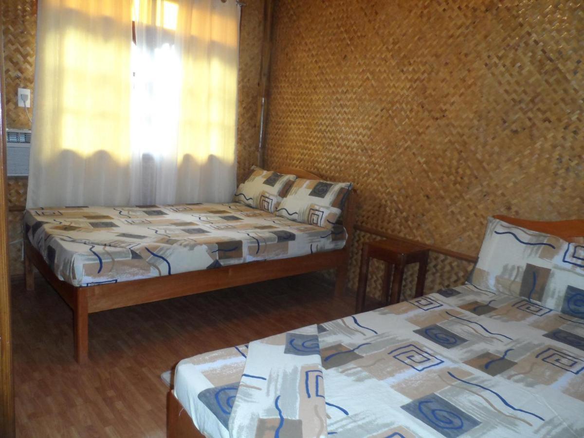 Victoria Guest House And Cottages Пуэрто-Принцеса Номер фото