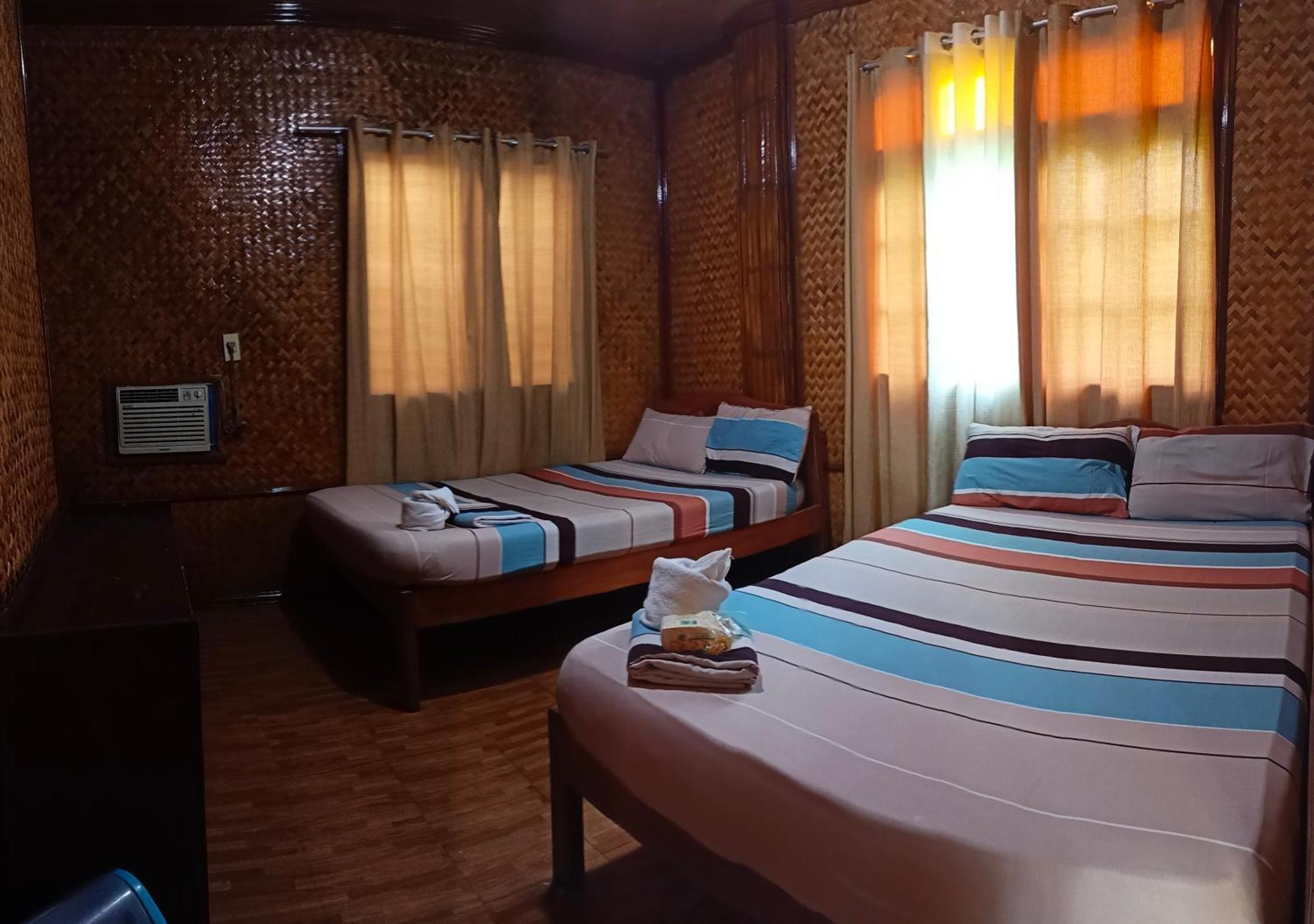Victoria Guest House And Cottages Пуэрто-Принцеса Экстерьер фото